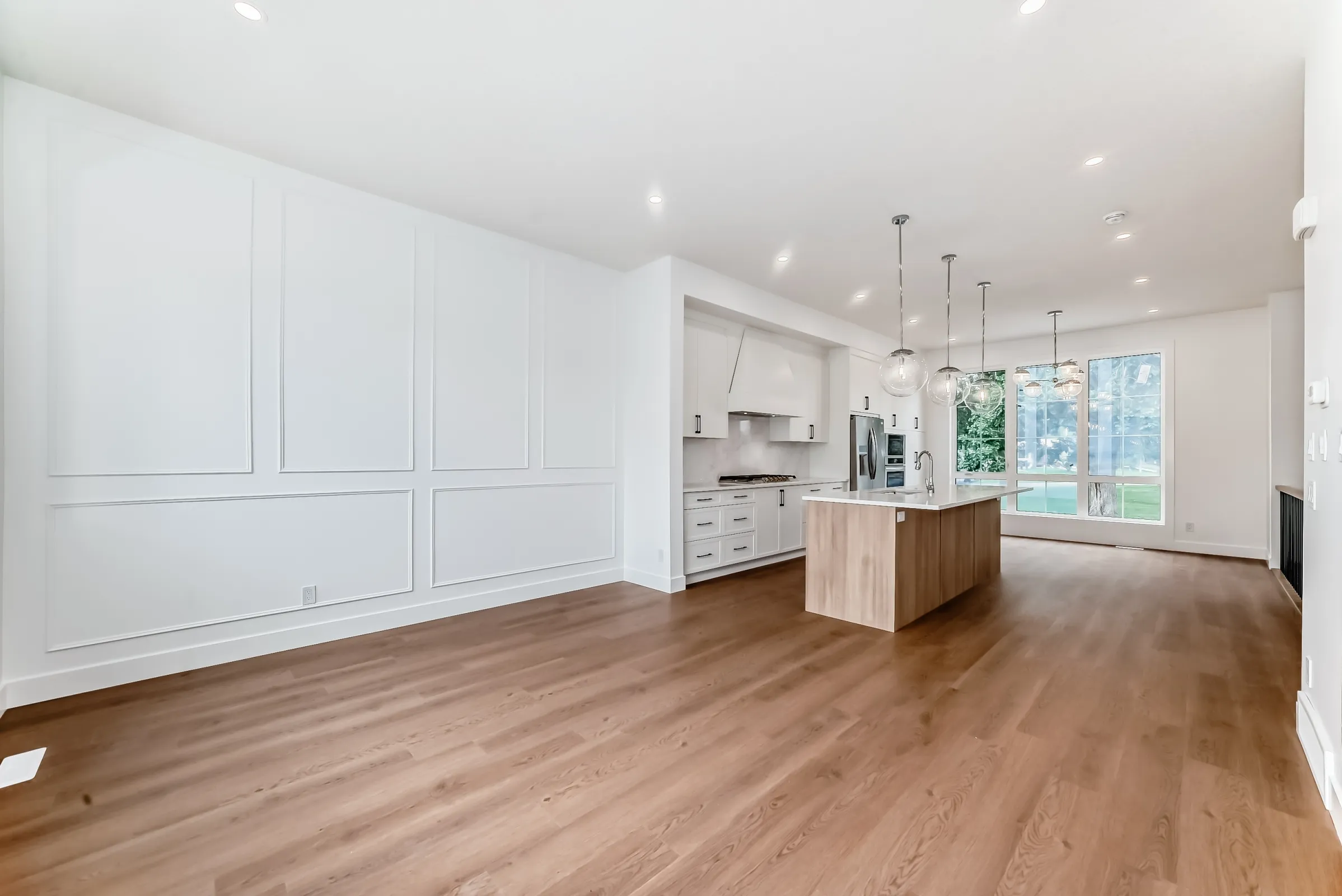 A bright open-concept living space in a Calgary rental home managed by NEXA