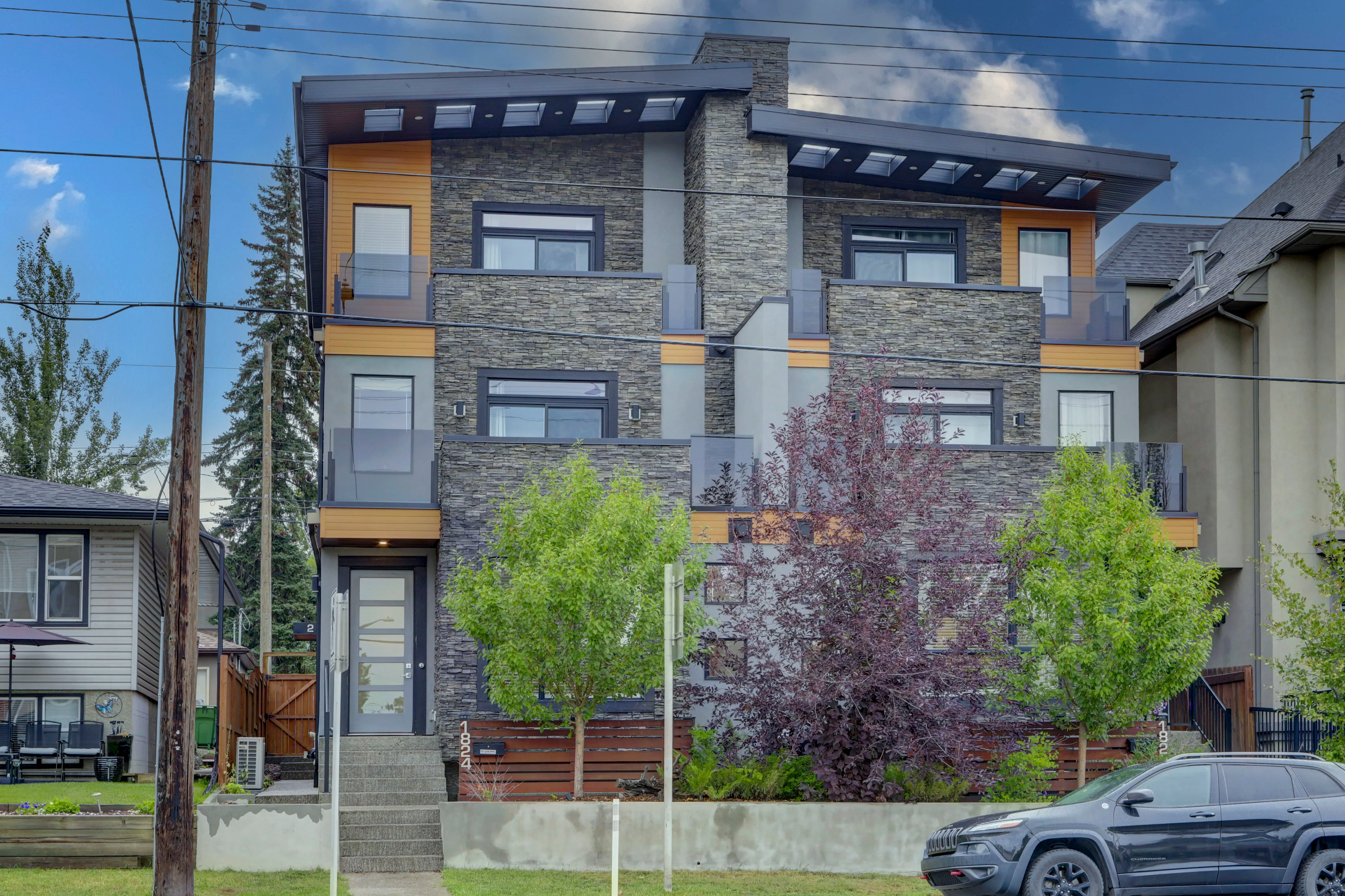 A modern three-storey townhouse in Calgary — condo management services